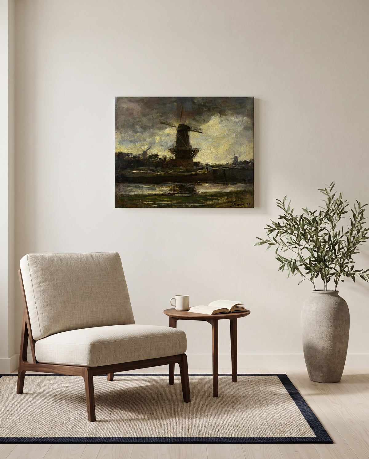 Three Windmills by Jacob Maris as a stretched canvas above a linen lounge chair in a reading corner