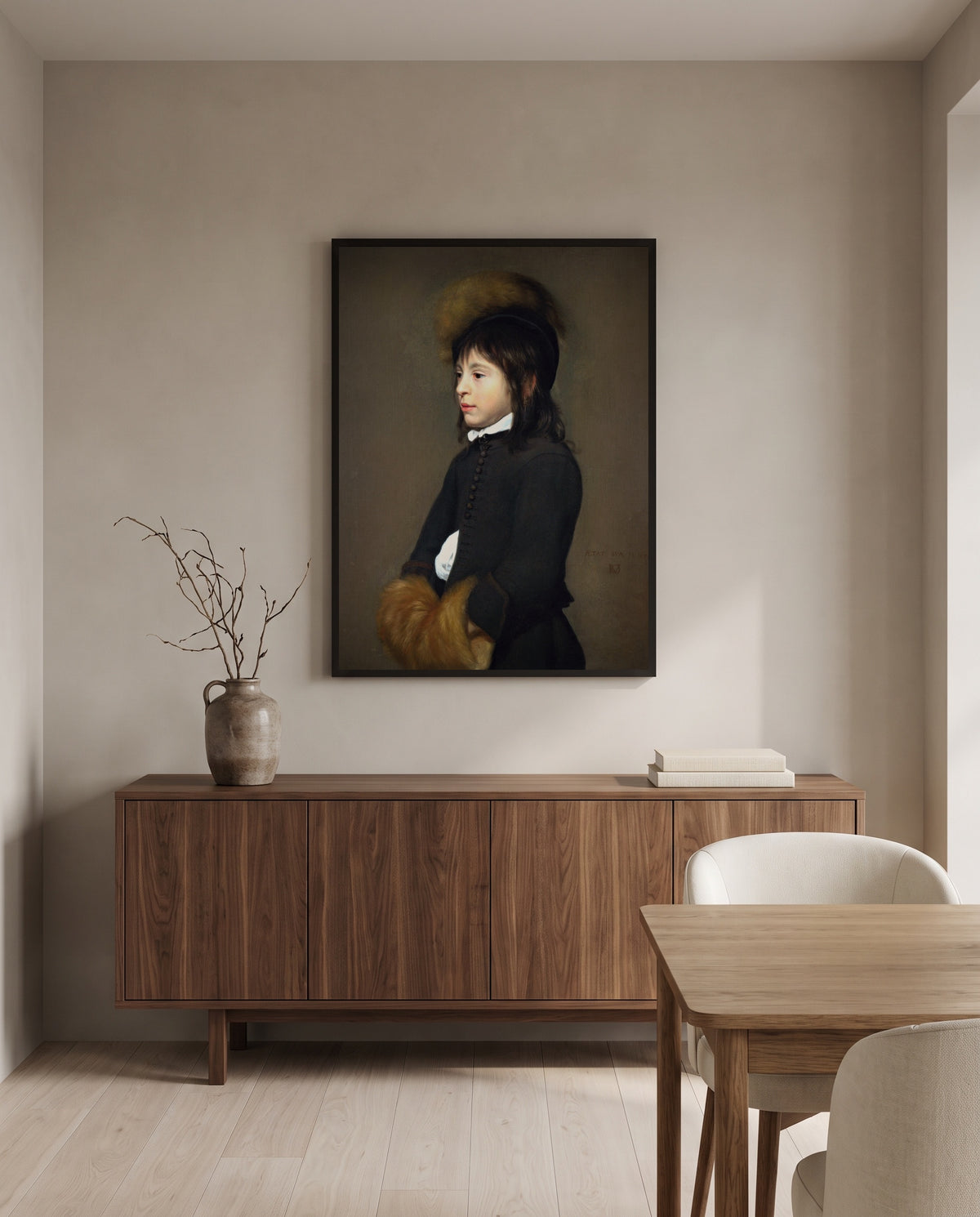 Portrait of a Boy Aged 11 by Jacob van Oost the Elder in a black frame above a walnut sideboard in a dining room