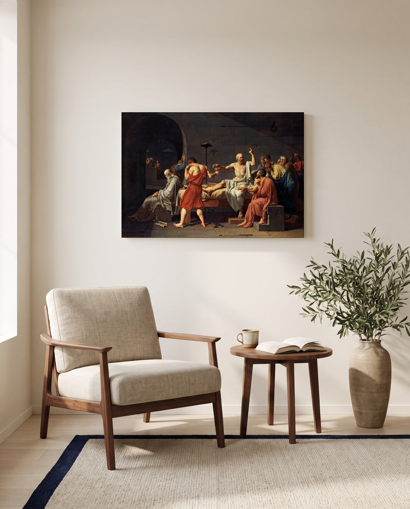 The Death of Socrates by Jacques-Louis David as a stretched canvas above a linen lounge chair in a reading corner