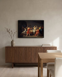 The Death of Socrates by Jacques-Louis David in a black frame above a walnut sideboard in a dining room