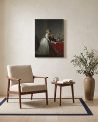 The Lavoisiers by Jacques-Louis David as a stretched canvas above a linen lounge chair in a reading corner