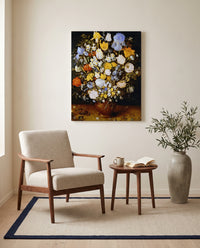 Small Bouquet of Flowers by Jan Brueghel the Elder as a stretched canvas above a linen lounge chair in a reading corner