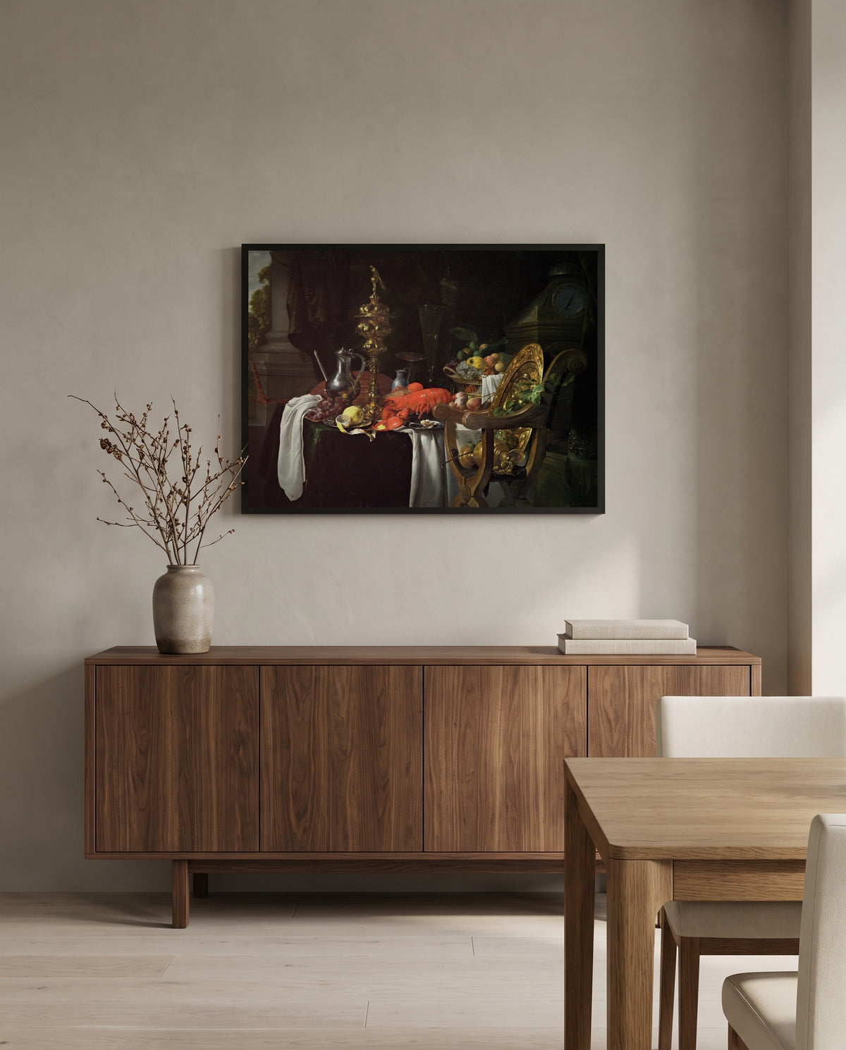 A Banqueting Scene by Jan Davidsz. de Heem in a black frame above a walnut sideboard in a dining room