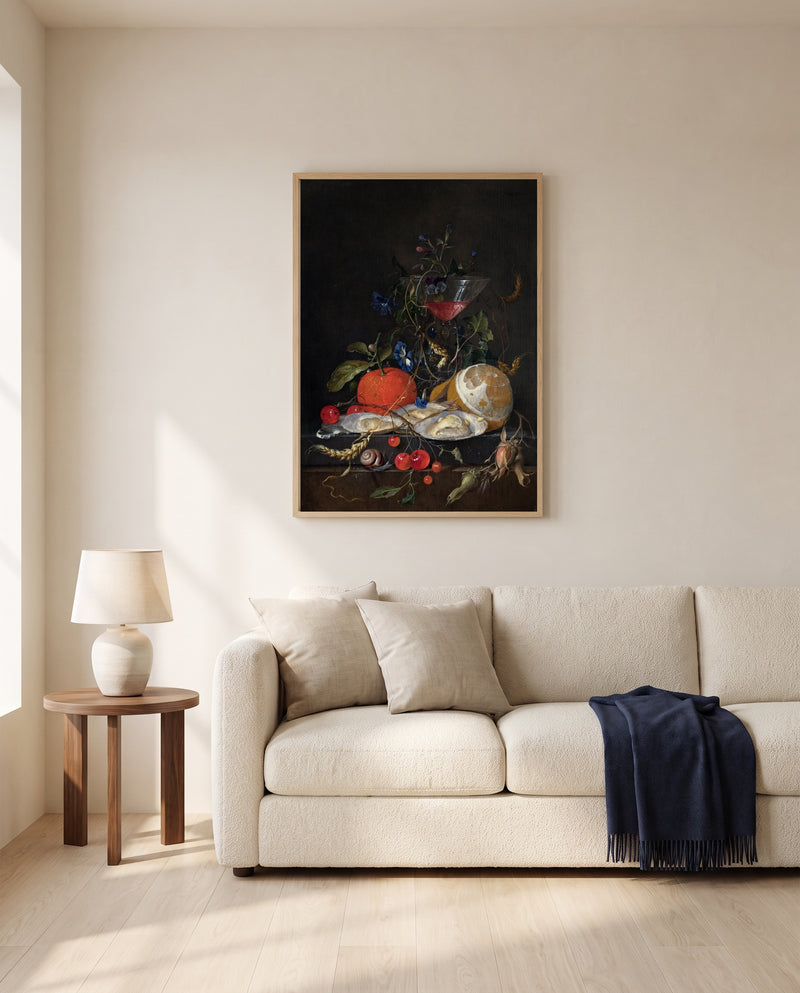 Oysters, Lemon and Wine by Jan Davidsz. de Heem framed in natural oak above a cream sofa in a warm living room