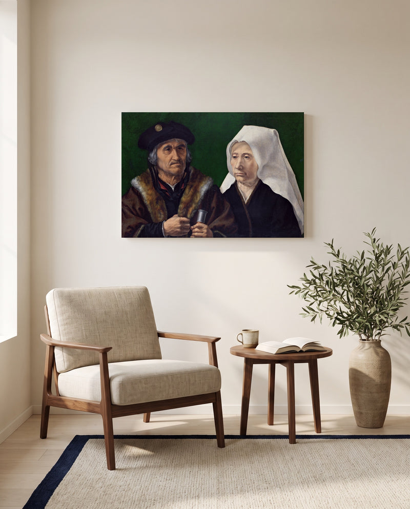 An Elderly Couple by Jan Gossaert as a stretched canvas above a linen lounge chair in a reading corner