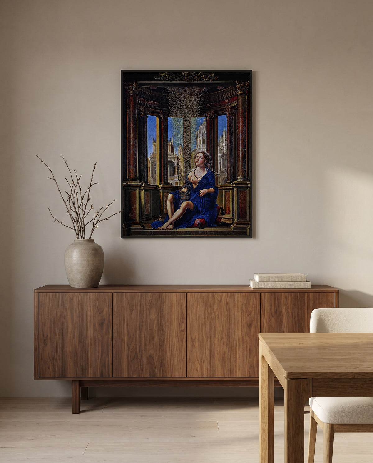 Danaë by Jan Gossaert in a black frame above a walnut sideboard in a dining room