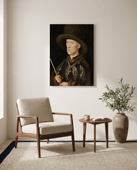 Baudouin de Lannoy by Jan van Eyck as a stretched canvas above a linen lounge chair in a reading corner