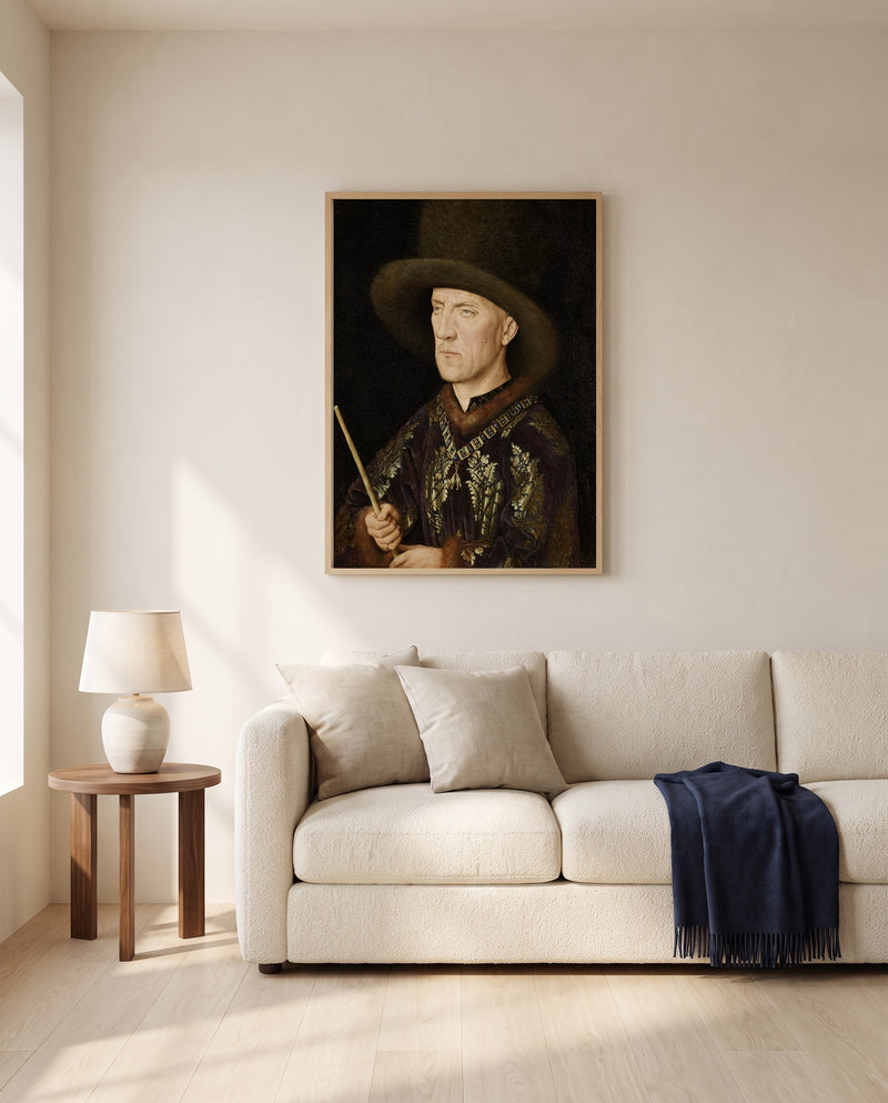 Baudouin de Lannoy by Jan van Eyck framed in natural oak above a cream sofa in a warm living room