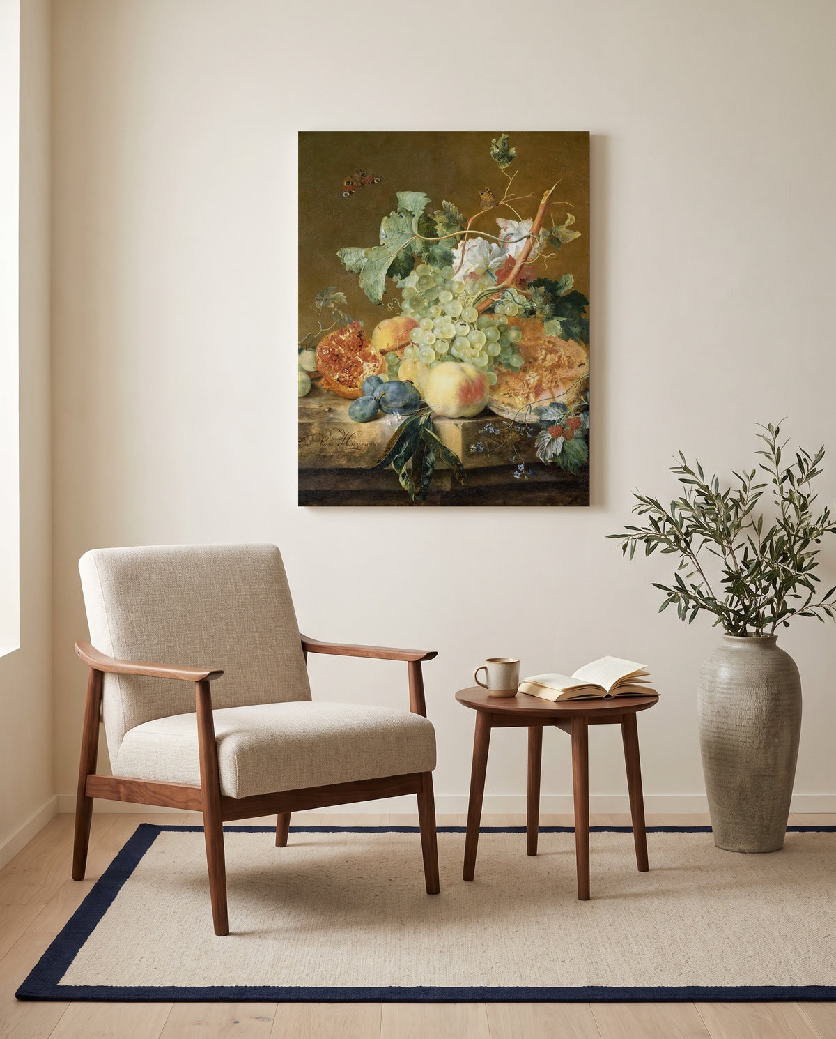 Still Life with Fruit by Jan van Huysum as a stretched canvas above a linen lounge chair in a reading corner