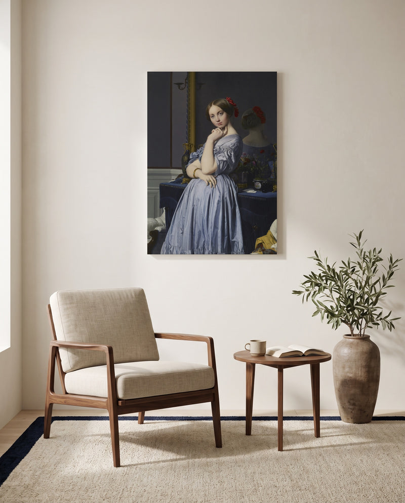 Comtesse d’Haussonville by Jean-Auguste-Dominique Ingres as a stretched canvas above a linen lounge chair in a reading corner