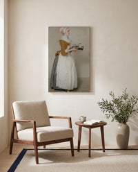 The Chocolate Girl by Jean-Étienne Liotard as a stretched canvas above a linen lounge chair in a reading corner