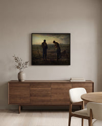 The Angelus by Jean-François Millet in a black frame above a walnut sideboard in a dining room