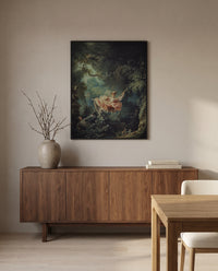 The Swing by Jean-Honoré Fragonard in a black frame above a walnut sideboard in a dining room