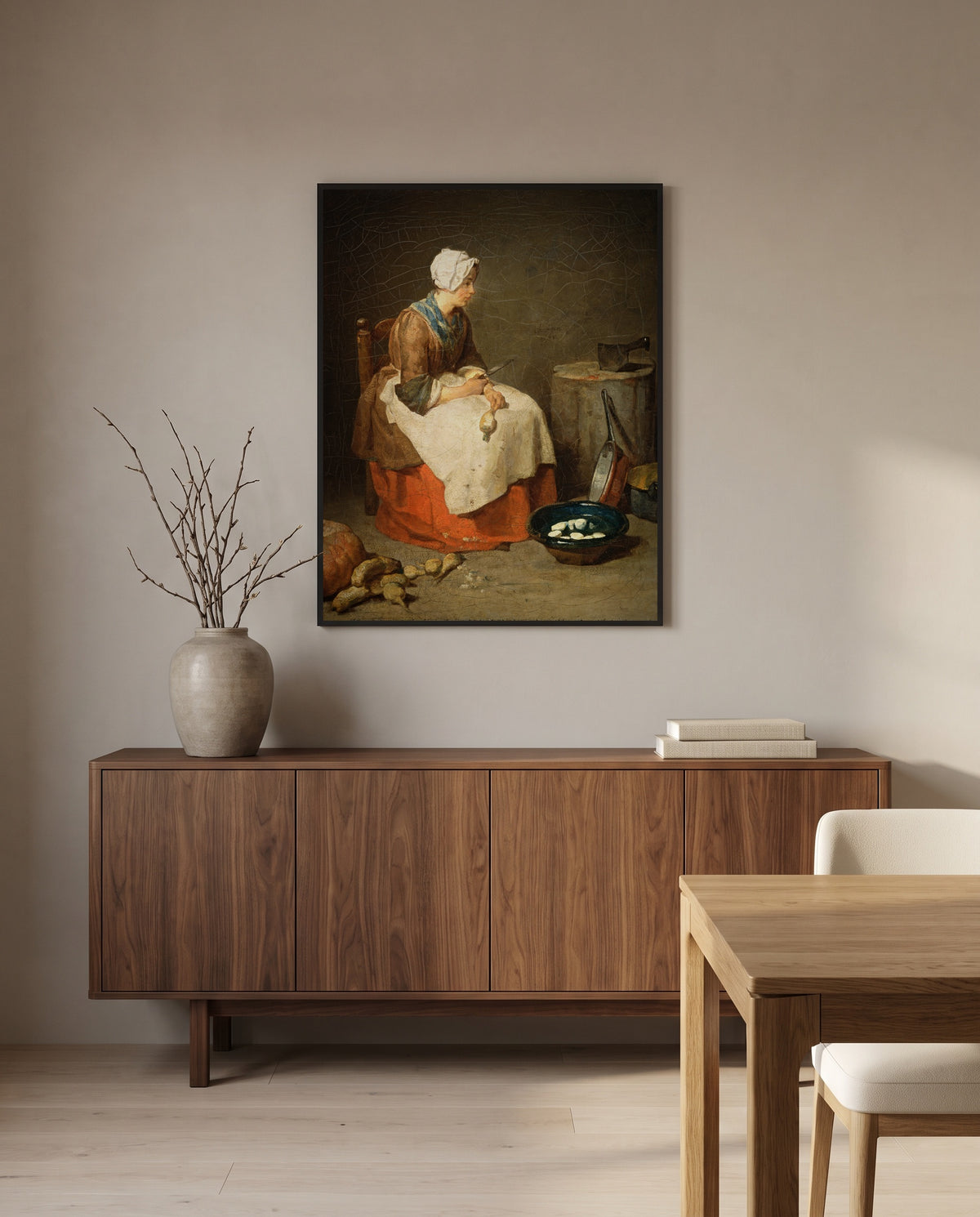 The Kitchen Maid by Jean Siméon Chardin in a black frame above a walnut sideboard in a dining room