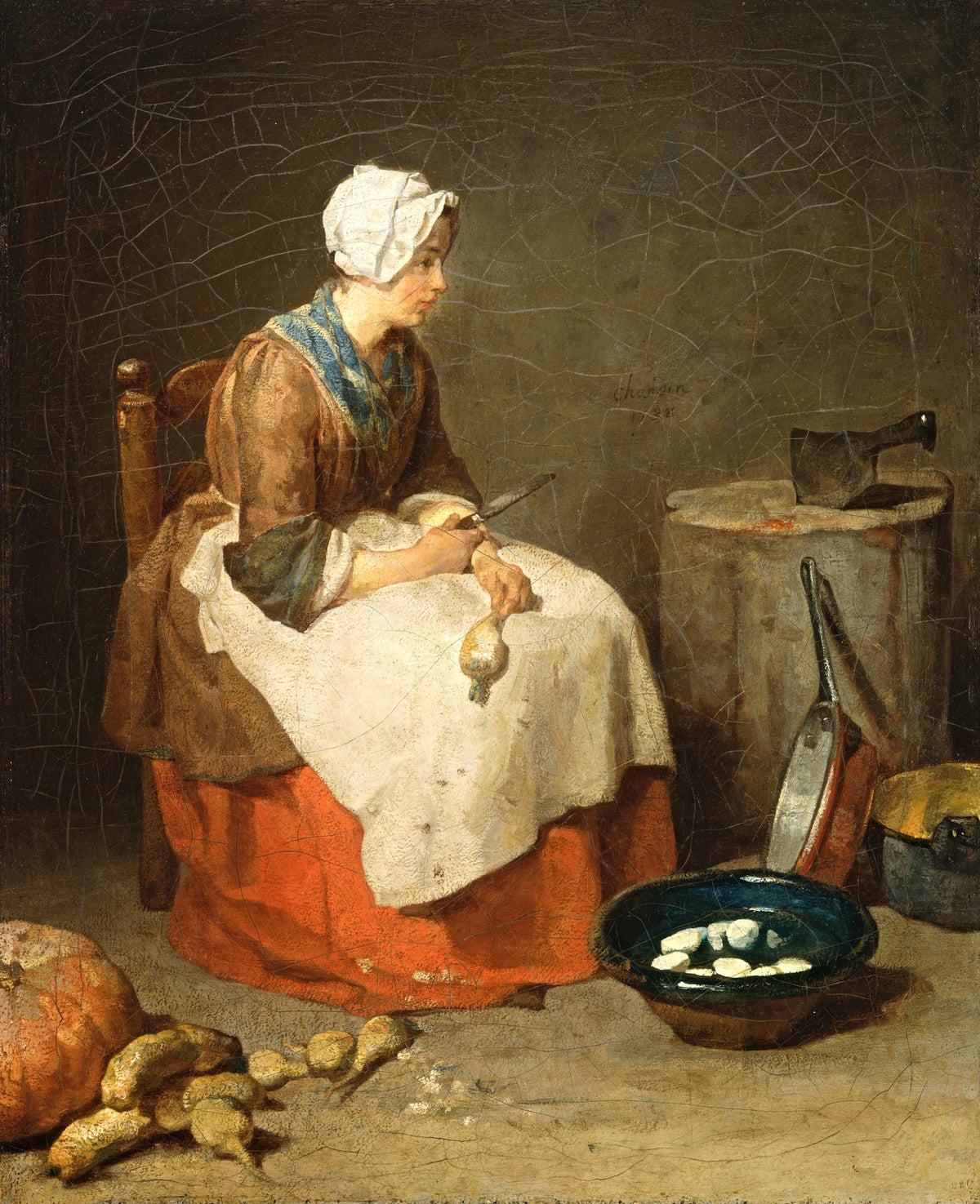 The Kitchen Maid by Chardin: a young woman on a low chair pauses from peeling turnips, pots and vegetables at her feet