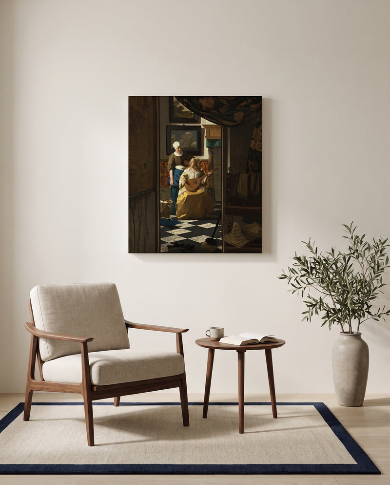 The Love Letter by Johannes Vermeer as a stretched canvas above a linen lounge chair in a reading corner