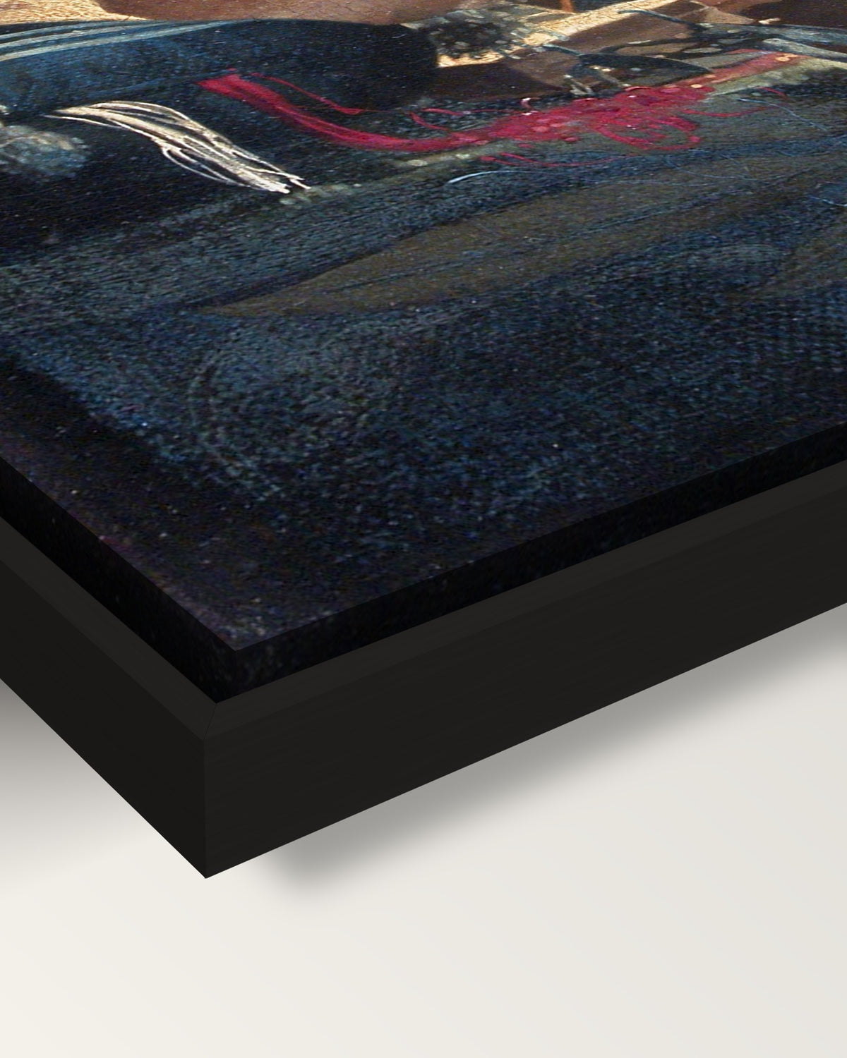 The Lacemaker framed canvas, corner close-up: the canvas in a slim black floating frame, its painted edge in the shadow gap