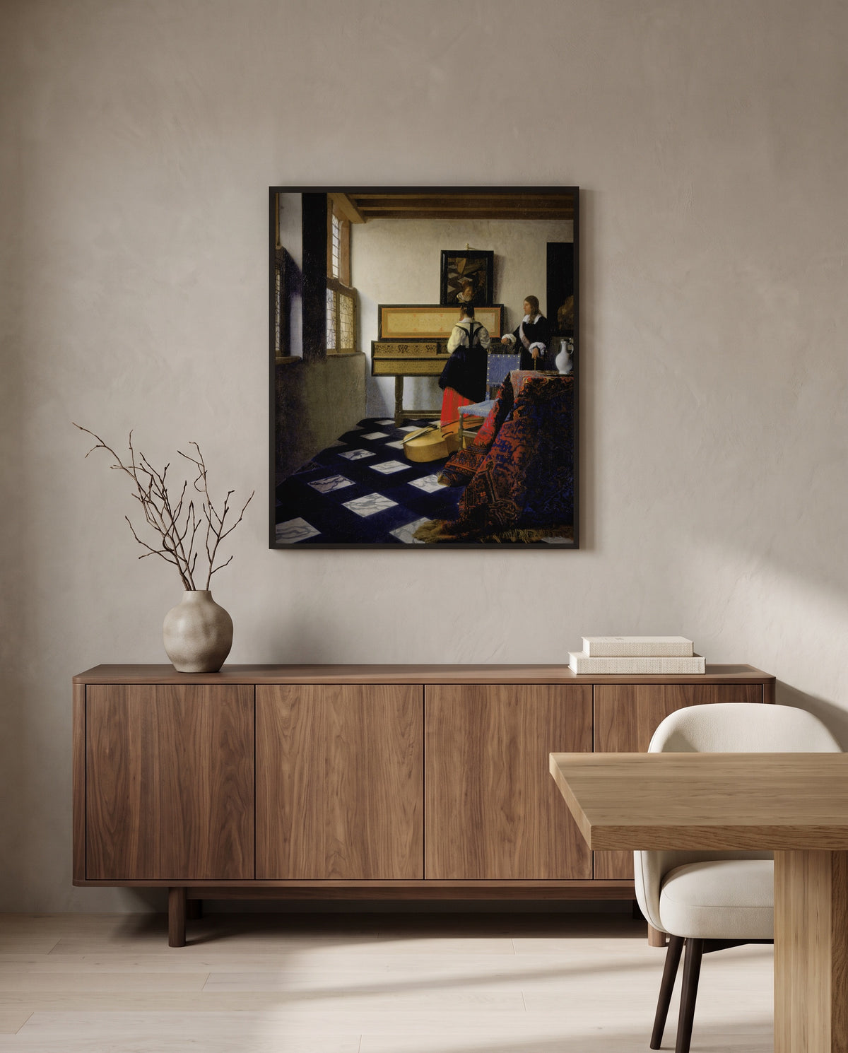 The Music Lesson by Johannes Vermeer in a black frame above a walnut sideboard in a dining room