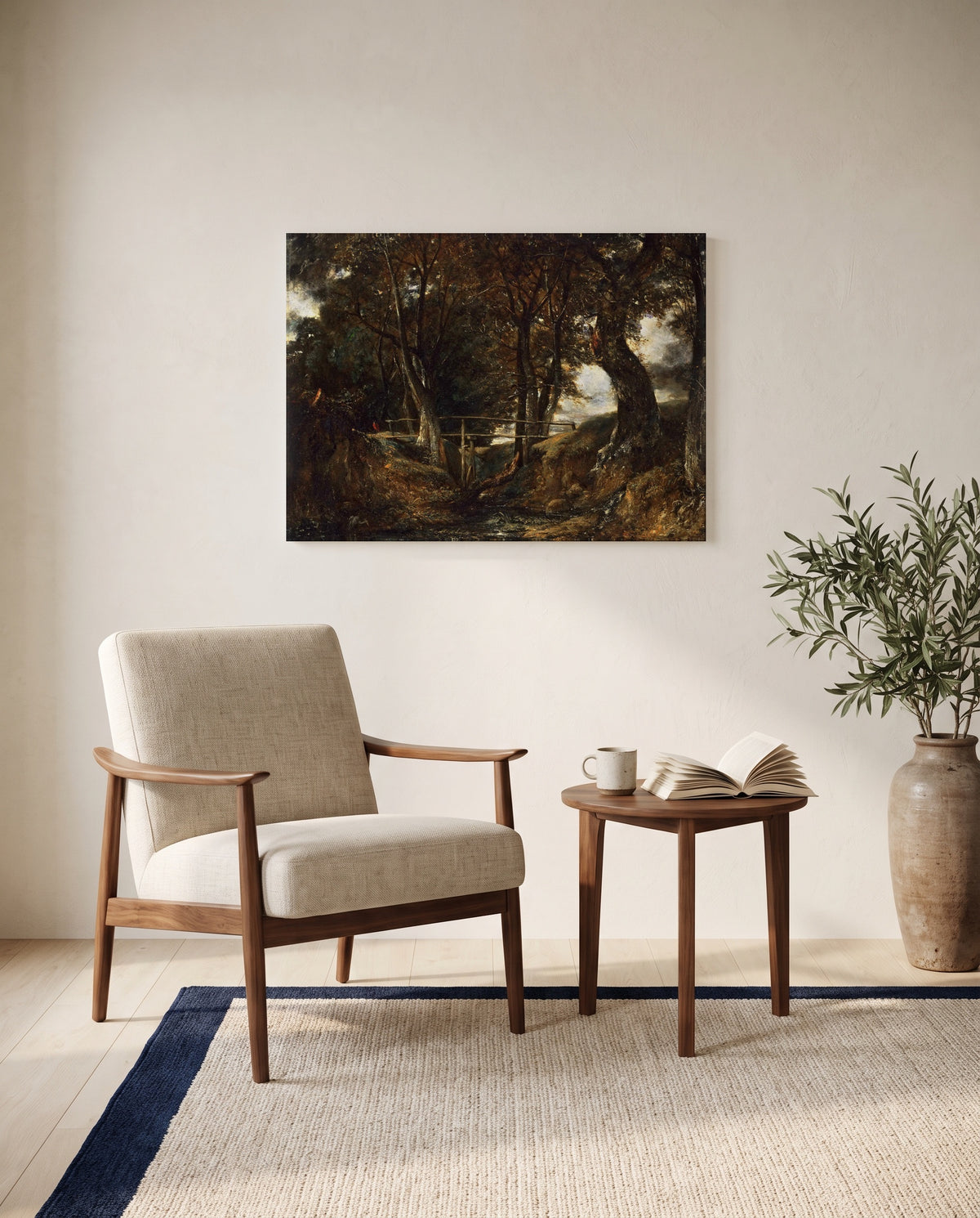 Dell at Helmingham Park by John Constable as a stretched canvas above a linen lounge chair in a reading corner