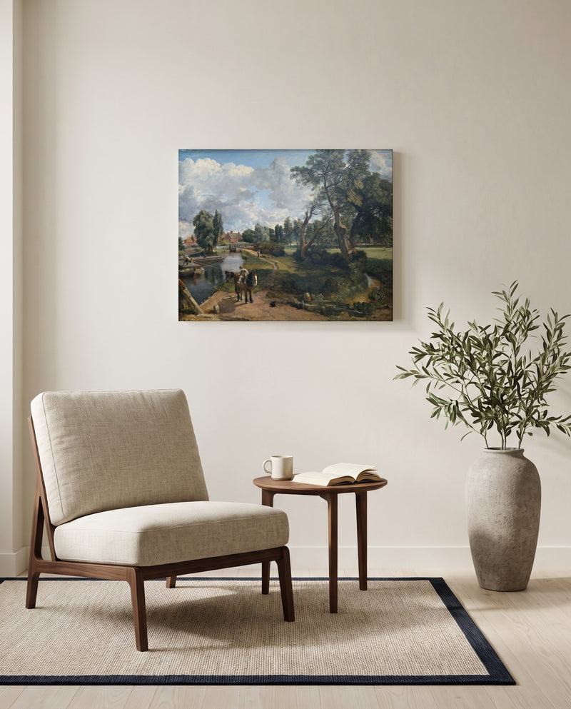 Flatford Mill by John Constable as a stretched canvas above a linen lounge chair in a reading corner