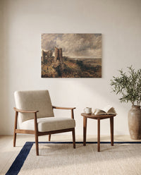 Hadleigh Castle by John Constable as a stretched canvas above a linen lounge chair in a reading corner