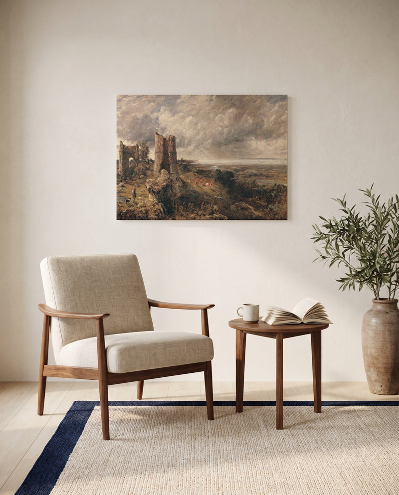 Hadleigh Castle by John Constable as a stretched canvas above a linen lounge chair in a reading corner