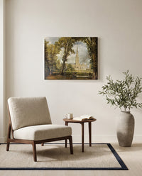 Salisbury Cathedral by John Constable as a stretched canvas above a linen lounge chair in a reading corner