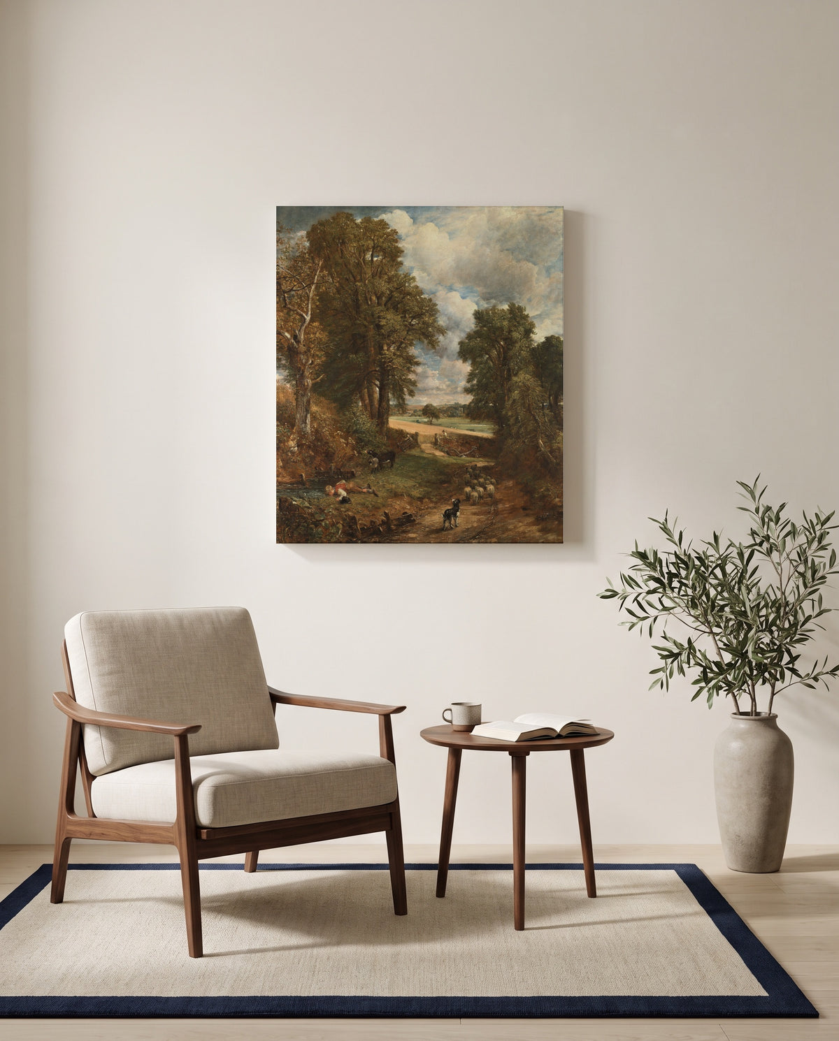 The Cornfield by John Constable as a stretched canvas above a linen lounge chair in a reading corner