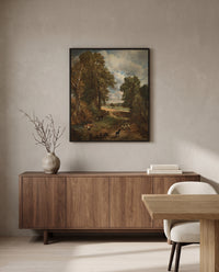 The Cornfield by John Constable in a black frame above a walnut sideboard in a dining room