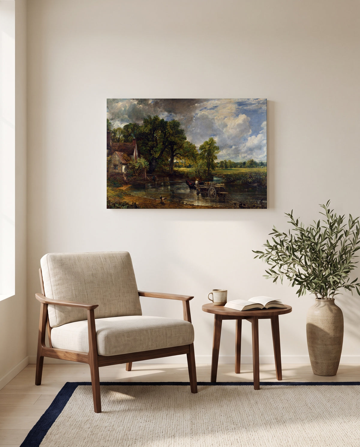 The Hay Wain by John Constable as a stretched canvas above a linen lounge chair in a reading corner