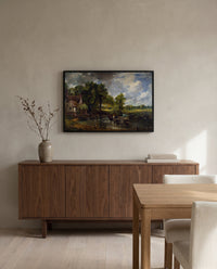 The Hay Wain by John Constable in a black frame above a walnut sideboard in a dining room