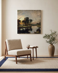 The Stour by John Constable as a stretched canvas above a linen lounge chair in a reading corner