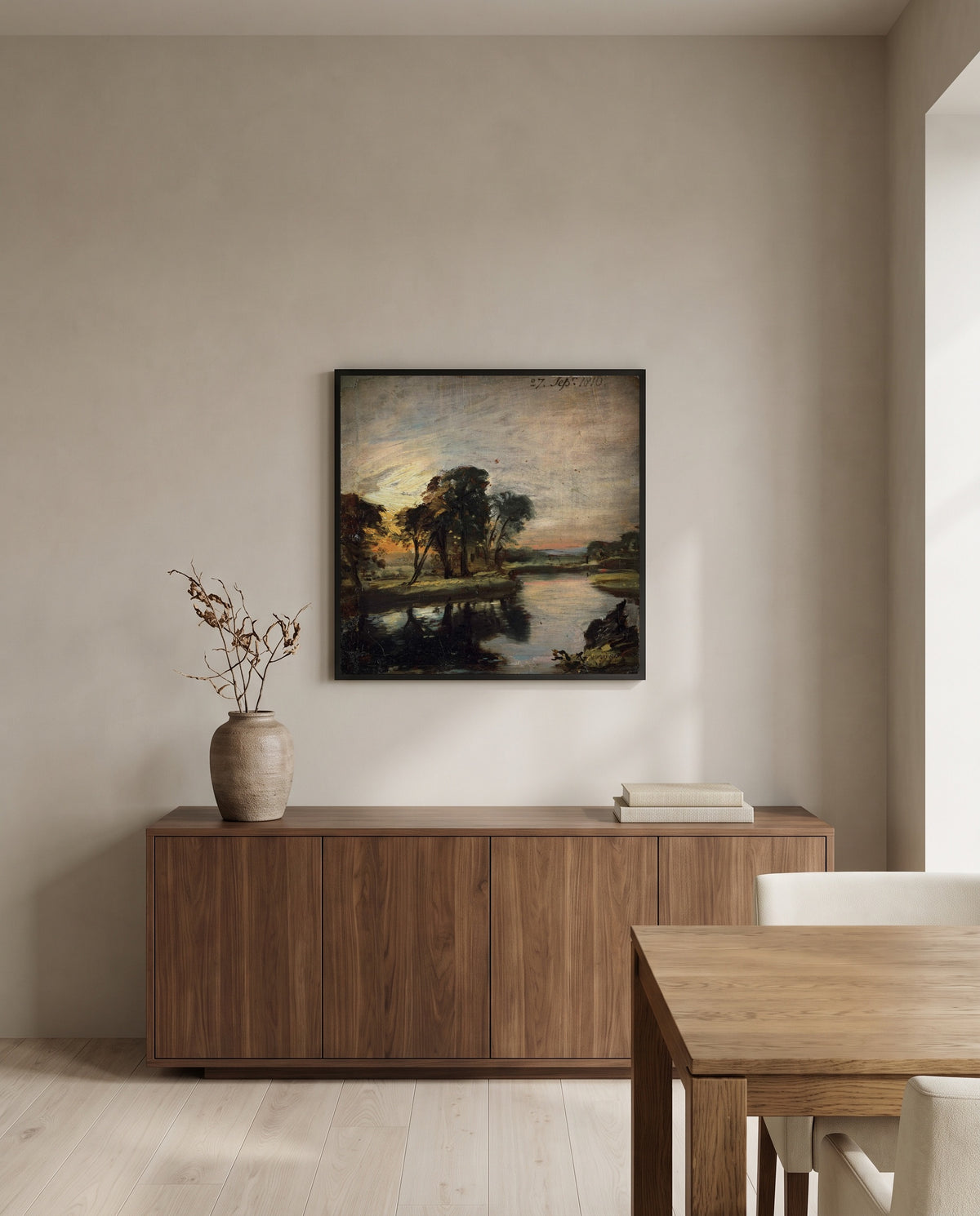 The Stour by John Constable in a black frame above a walnut sideboard in a dining room