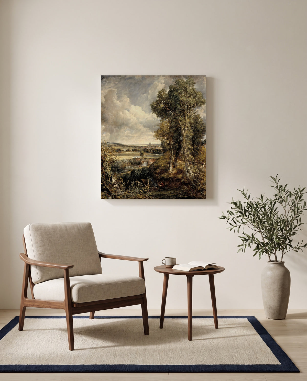 The Vale of Dedham by John Constable as a stretched canvas above a linen lounge chair in a reading corner