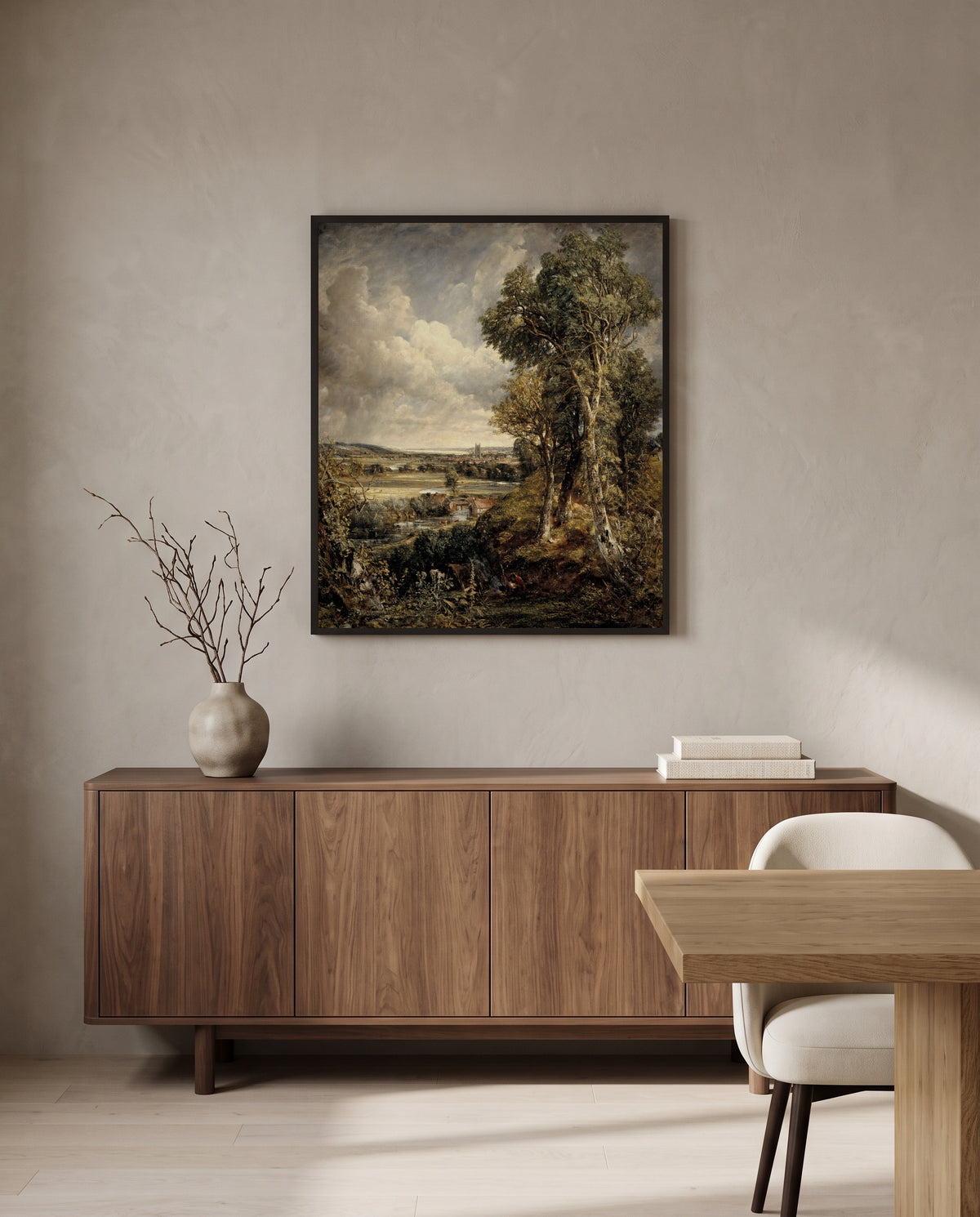 The Vale of Dedham by John Constable in a black frame above a walnut sideboard in a dining room