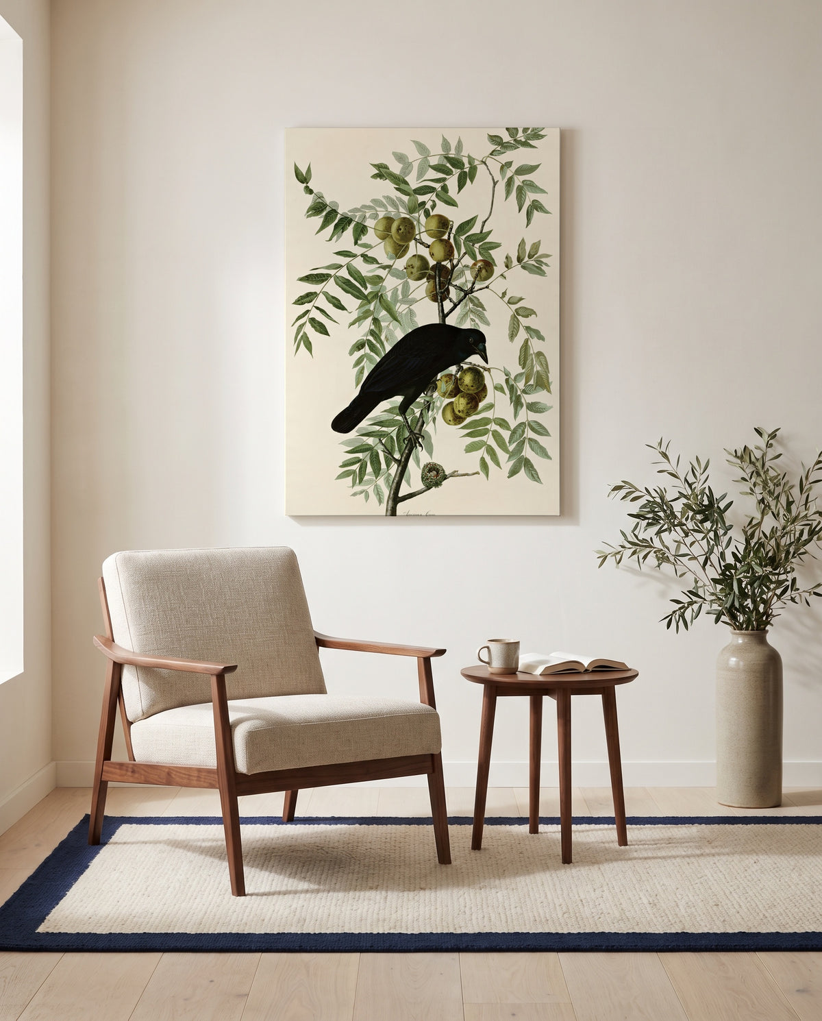 American Crow by John James Audubon as a stretched canvas above a linen lounge chair in a reading corner