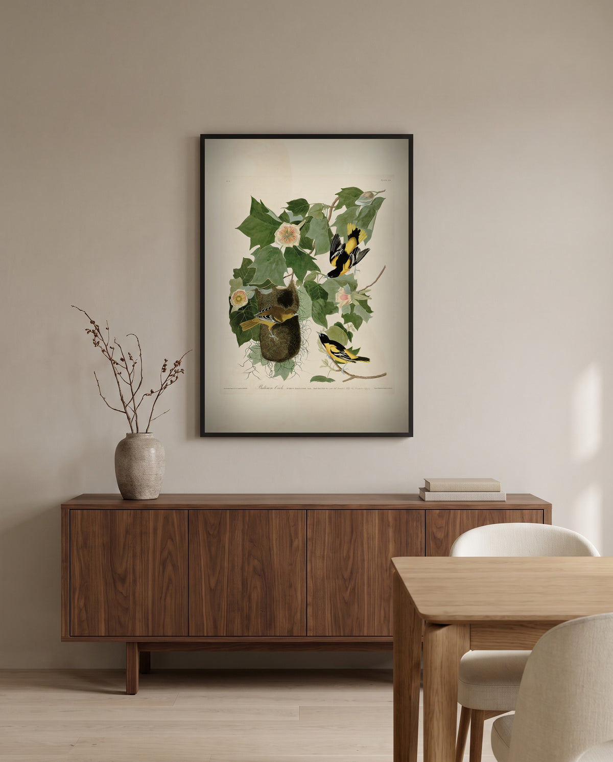 Baltimore Oriole by John James Audubon in a black frame above a walnut sideboard in a dining room
