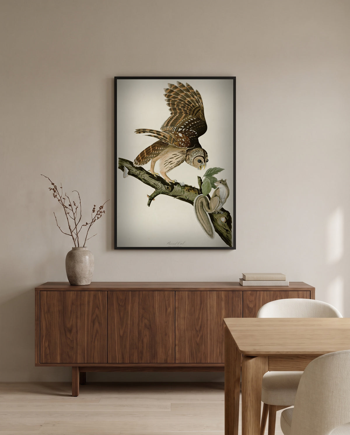 Barred Owl by John James Audubon in a black frame above a walnut sideboard in a dining room