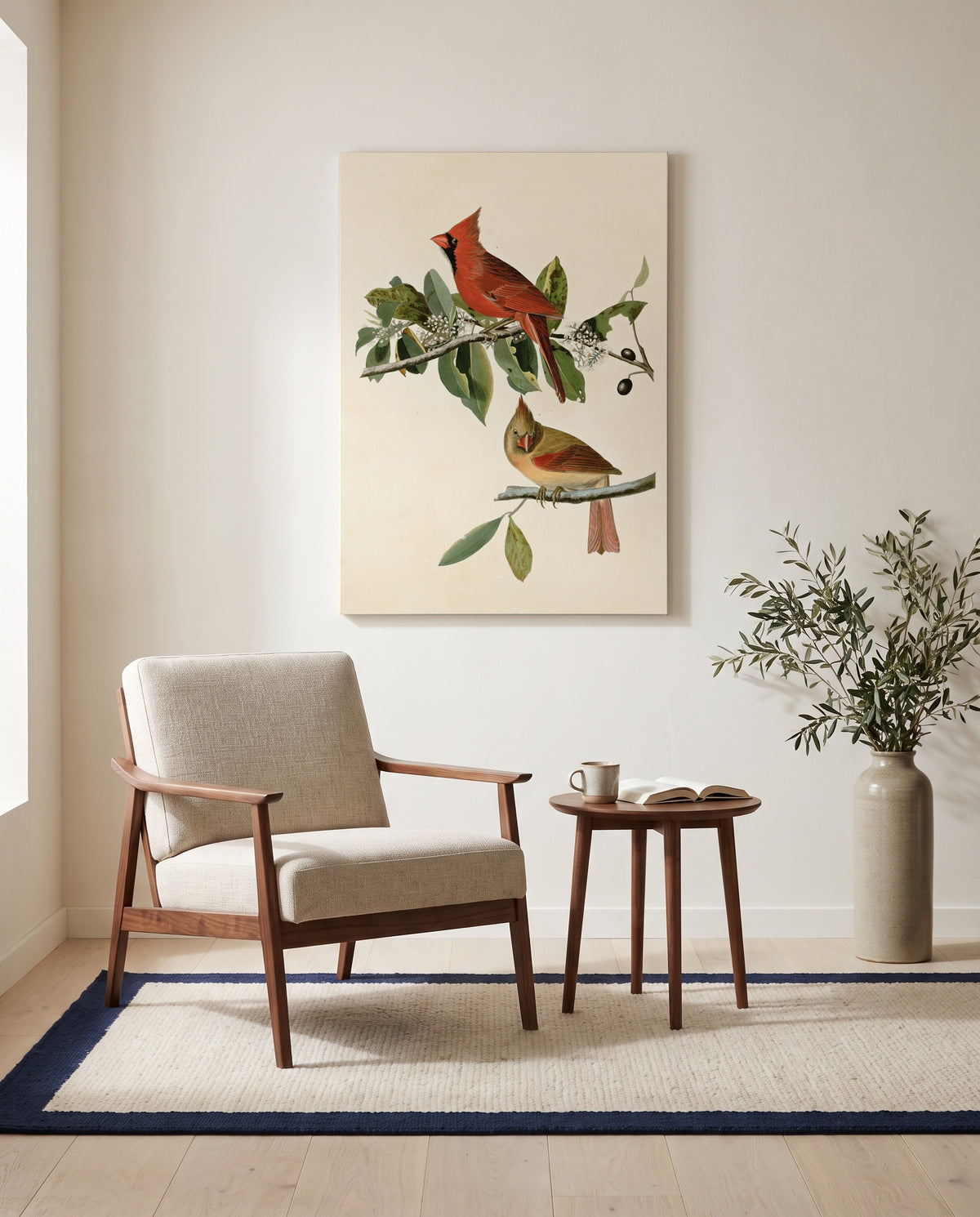 Cardinal Grosbeak by John James Audubon as a stretched canvas above a linen lounge chair in a reading corner