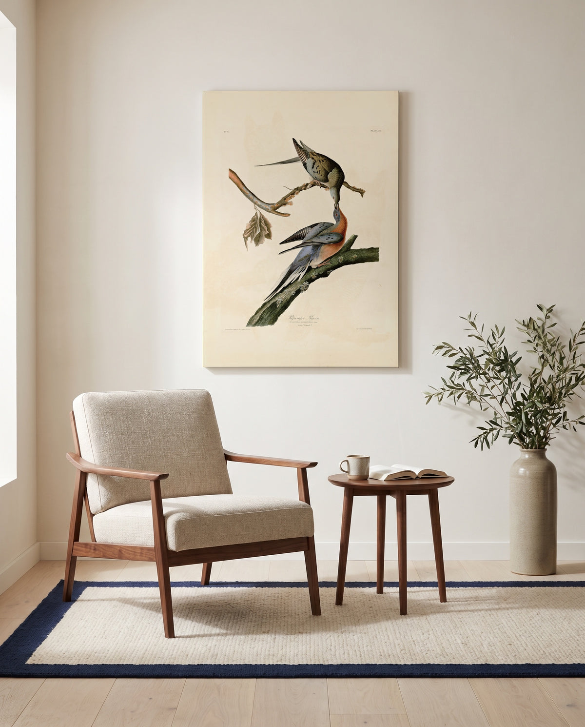 Passenger Pigeon by John James Audubon as a stretched canvas above a linen lounge chair in a reading corner