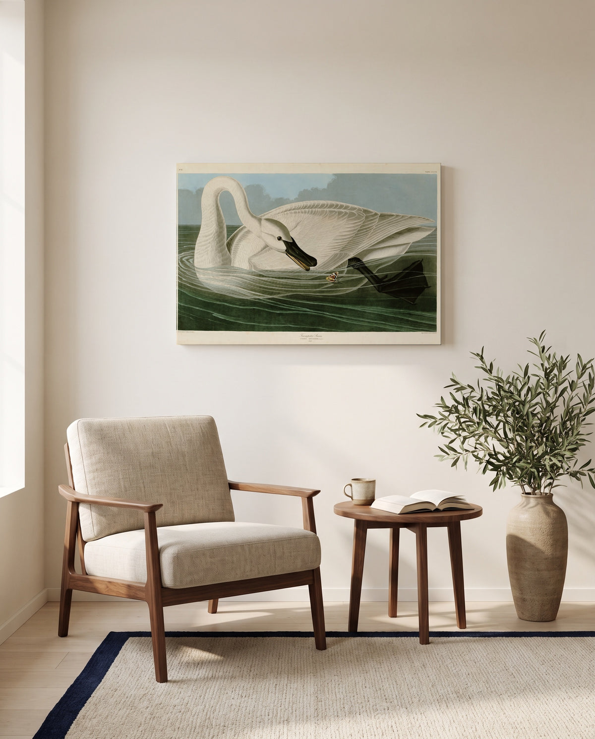 Trumpeter Swan by John James Audubon as a stretched canvas above a linen lounge chair in a reading corner