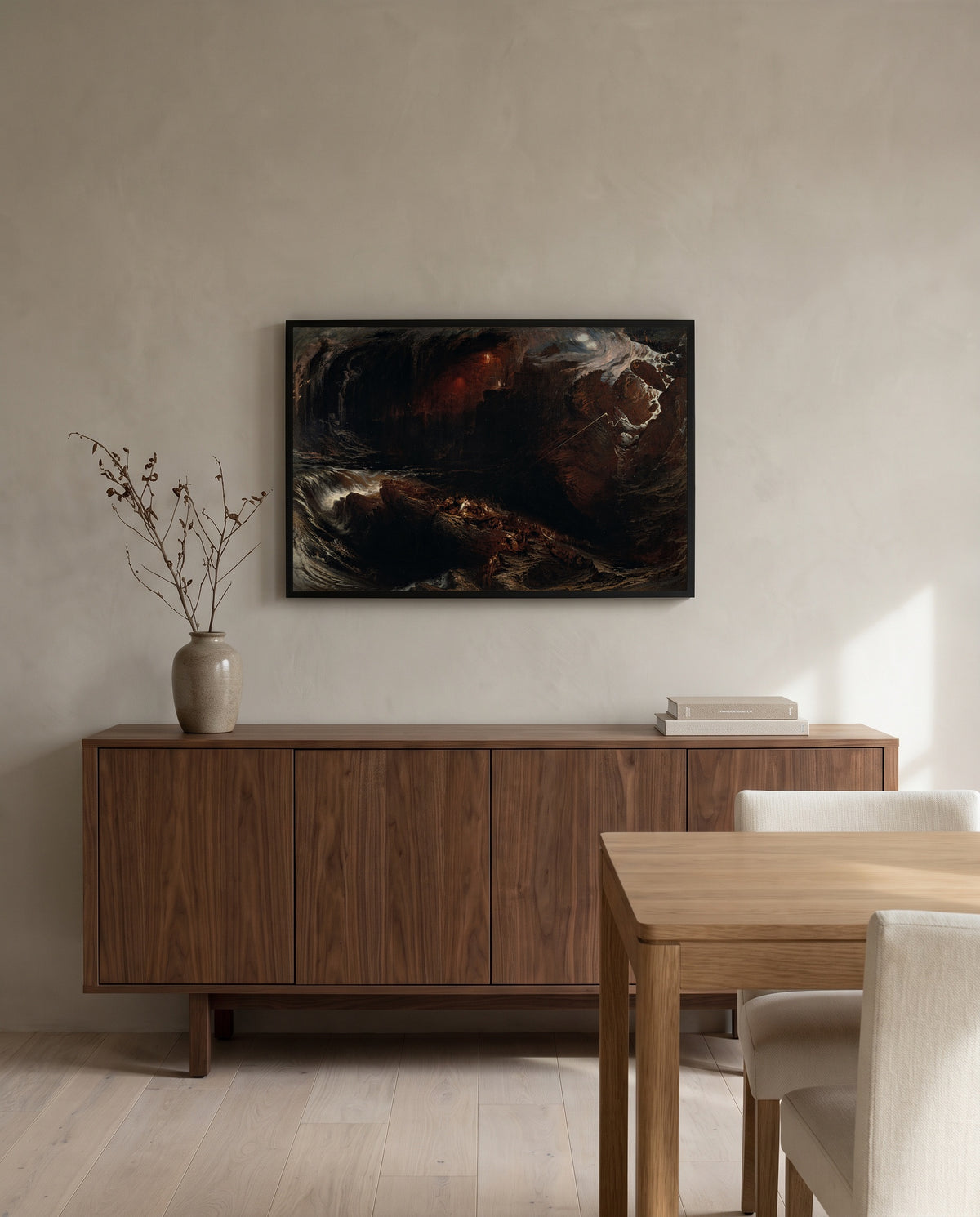 The Deluge by John Martin in a black frame above a walnut sideboard in a dining room