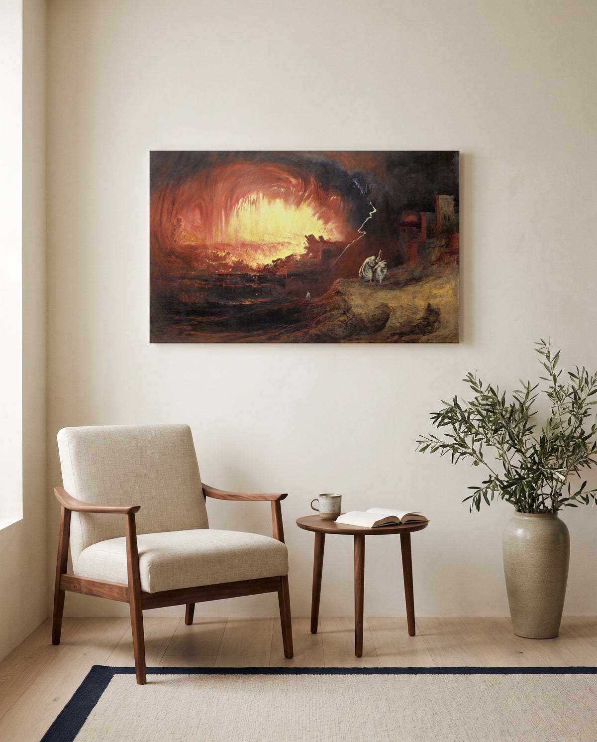 Sodom and Gomorrah by John Martin as a stretched canvas above a linen lounge chair in a reading corner