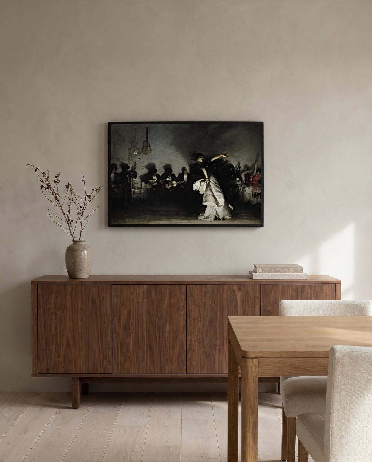 El Jaleo by John Singer Sargent in a black frame above a walnut sideboard in a dining room