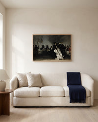 El Jaleo by John Singer Sargent framed in natural oak above a cream sofa in a warm living room