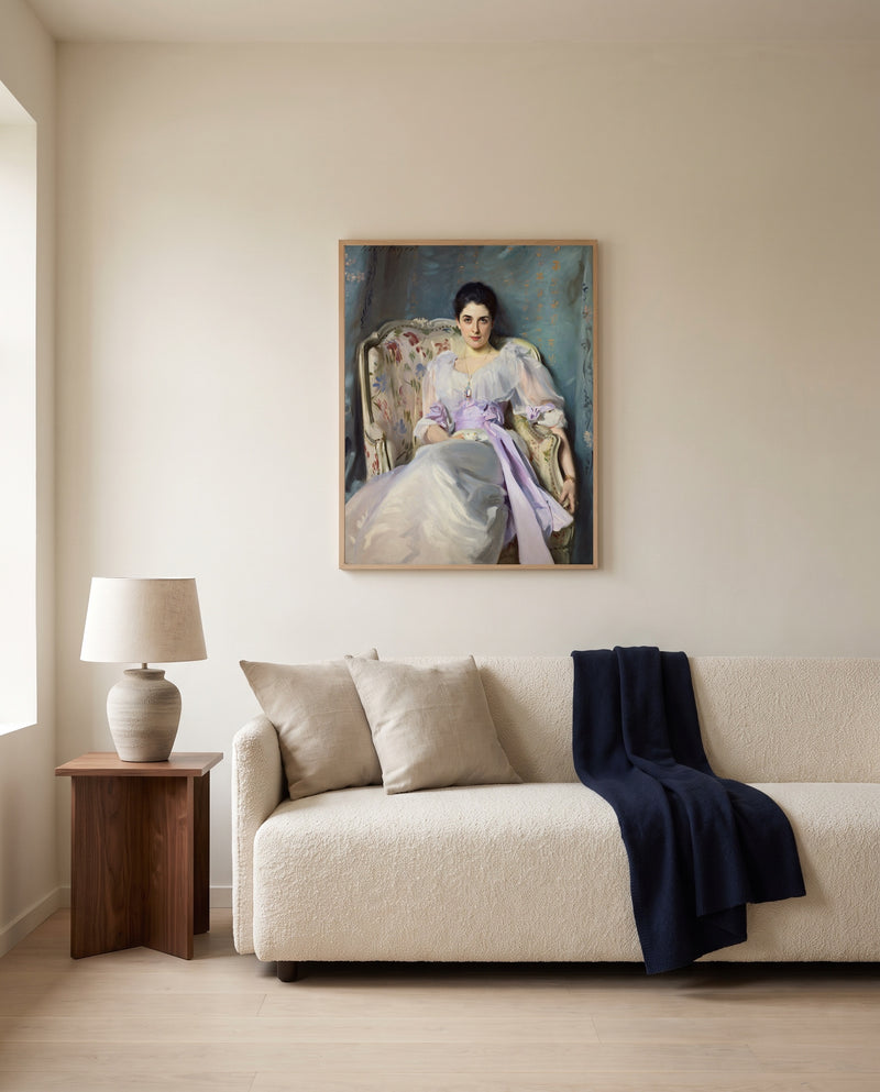 Lady Agnew of Lochnaw by John Singer Sargent framed in natural oak above a cream sofa in a warm living room