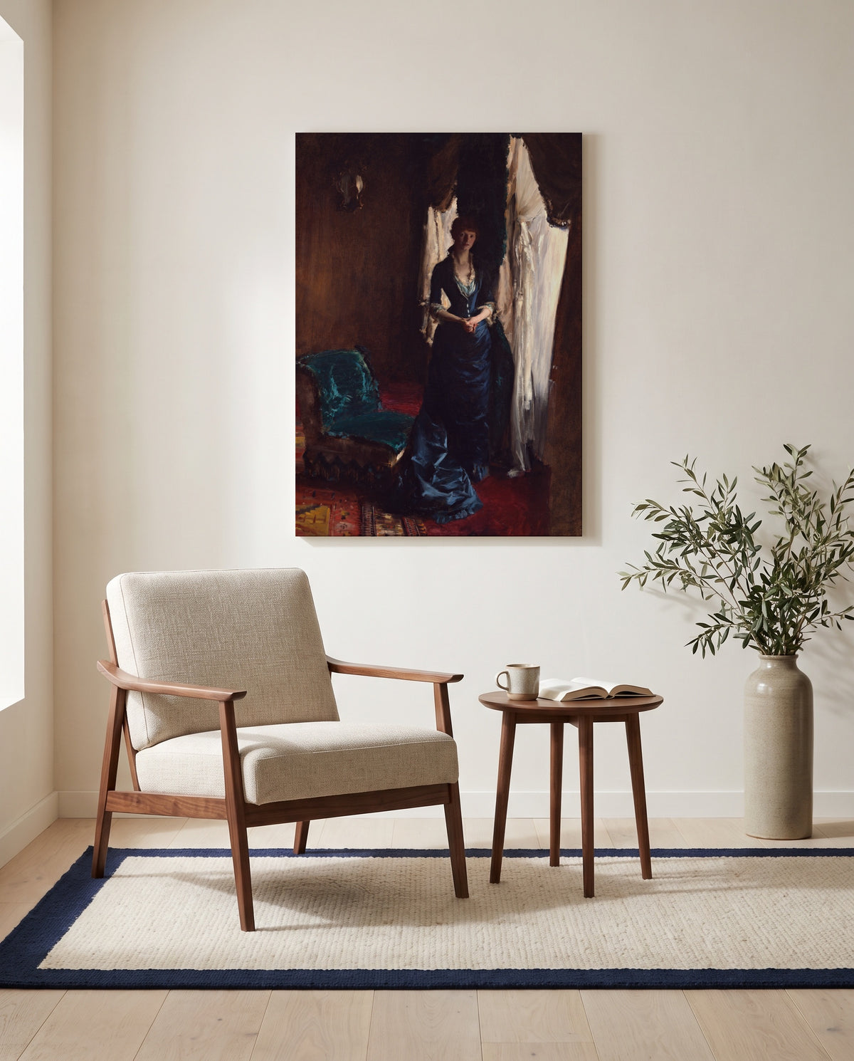 Madame Paul Escudier by John Singer Sargent as a stretched canvas above a linen lounge chair in a reading corner