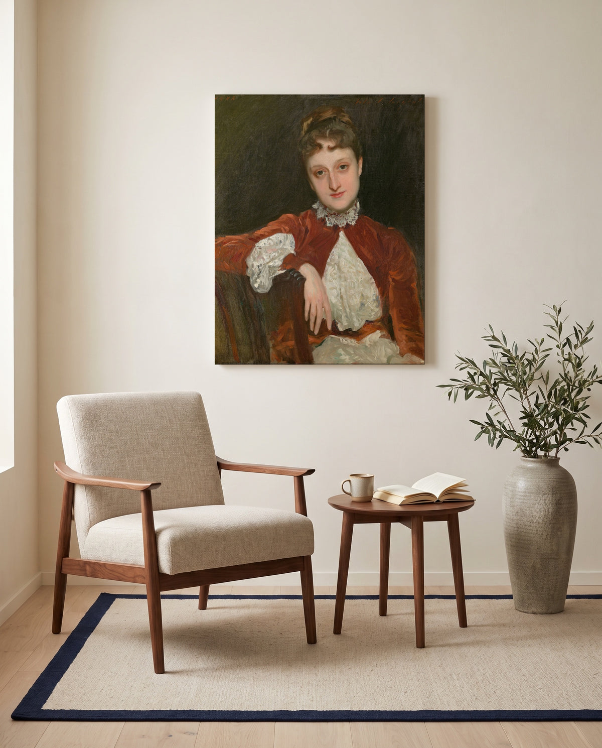 Mrs. Charles Deering by John Singer Sargent as a stretched canvas above a linen lounge chair in a reading corner