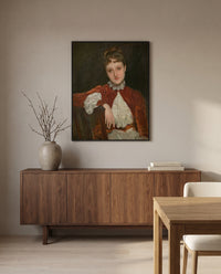 Mrs. Charles Deering by John Singer Sargent in a black frame above a walnut sideboard in a dining room
