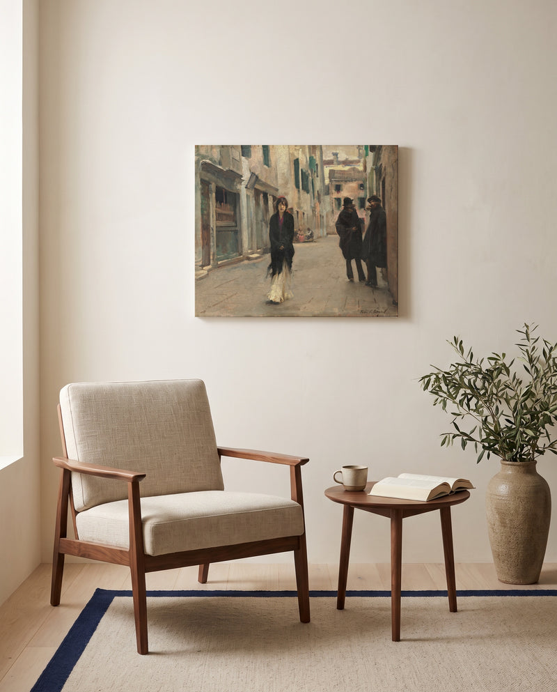 Street in Venice by John Singer Sargent as a stretched canvas above a linen lounge chair in a reading corner
